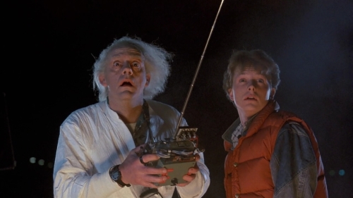 Christopher Lloyd and Michael J. Fox controlling the coolest remote control car ever.